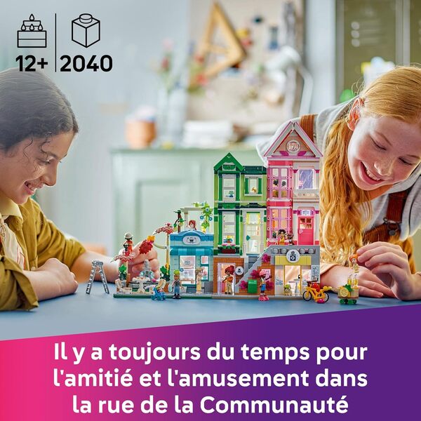 LEGO Friends Les Appartements et boutiques de Heartlake City - Idée de Cadeau pour Les Filles dès 12 Ans - Jeu de Construction Familial - 9 Personnages Dont 7 Mini-poupées et 3 Chats 42670